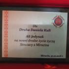 Pamiątkowy obrazek z życzeniami od strażackiej braci, który młodzi małżonkowie...